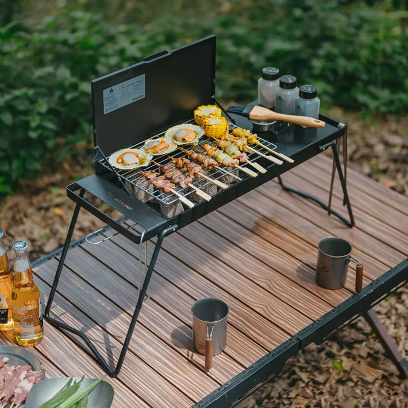 2-Naturehike-charcoal-stove-model-CNK2450CF014 اجاق زغالی نیچرهایک مدل CNK2450CF014،هنگام استفاده در طبیعت